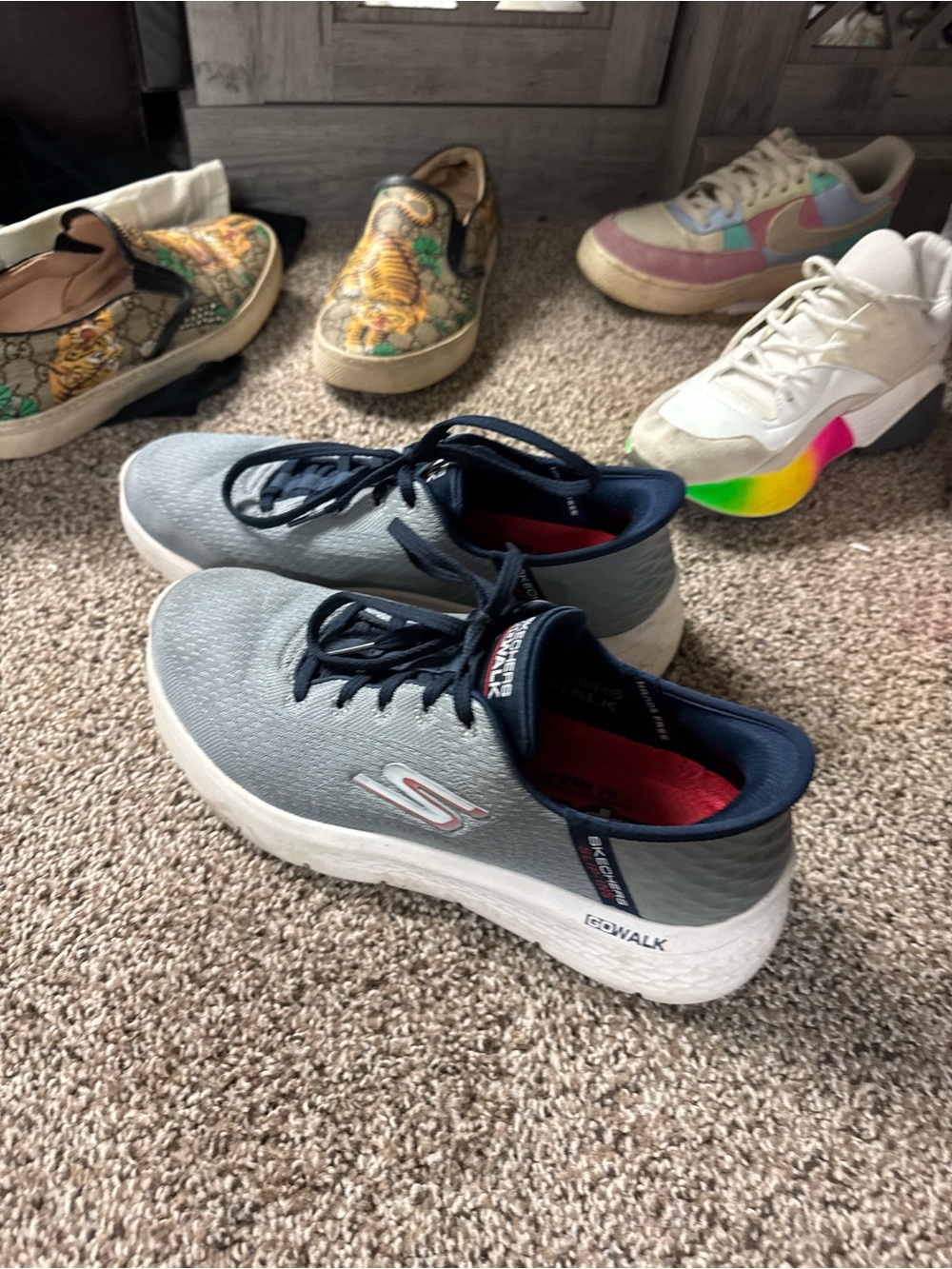 Skechers Gray and Navy GOwalk Slip-On Sneakers